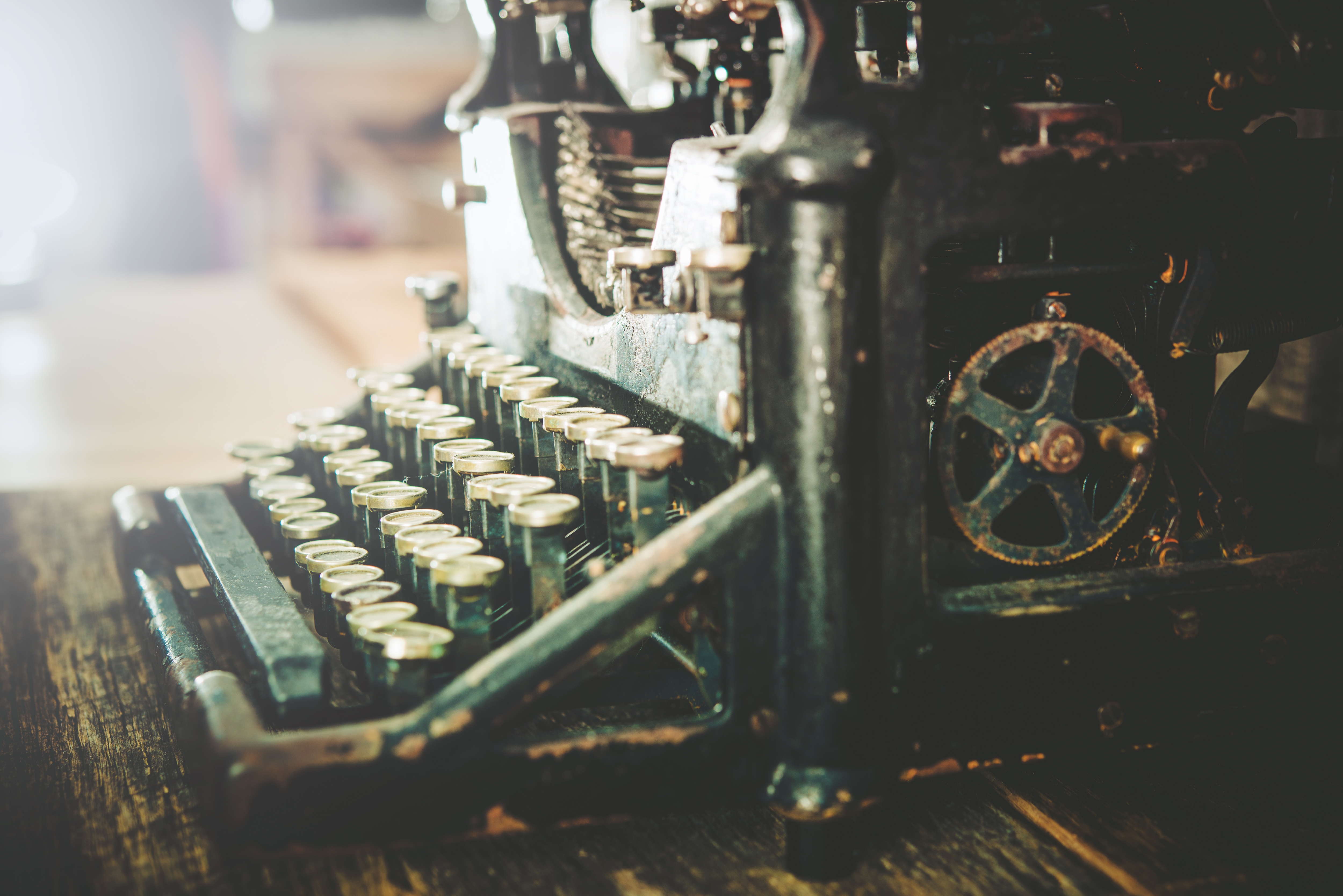 Rusty and Dusty Vintage Typewriter on Table. Retro Typewriter.